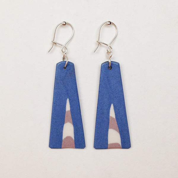 Porcelain and silver earrings , mainly blue in colour.